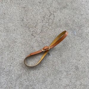 brown no-loop belt with gold hardware